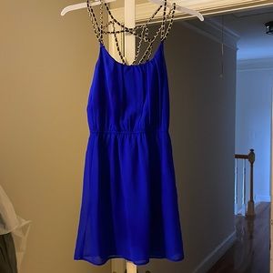 Royal blue dress with gold chain strap detailing